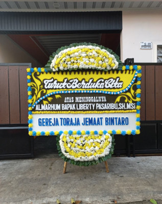 Papan Bunga Duka di Sooko